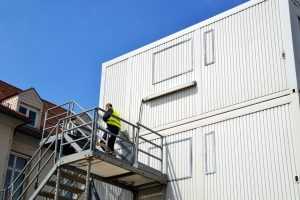 Temporary shelter for workers. Cargo container houses. Tiny living in container boxes